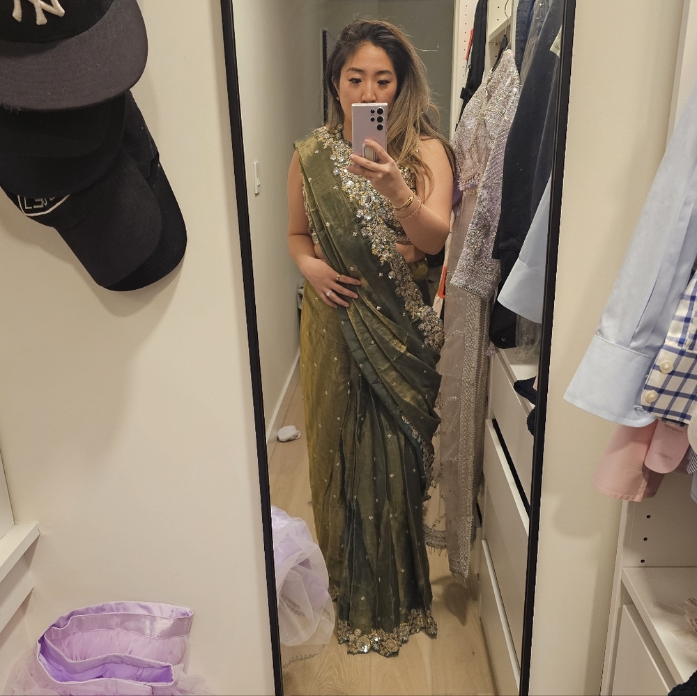 LASHKARAA Elegant Green Saree with Gold Embellishments